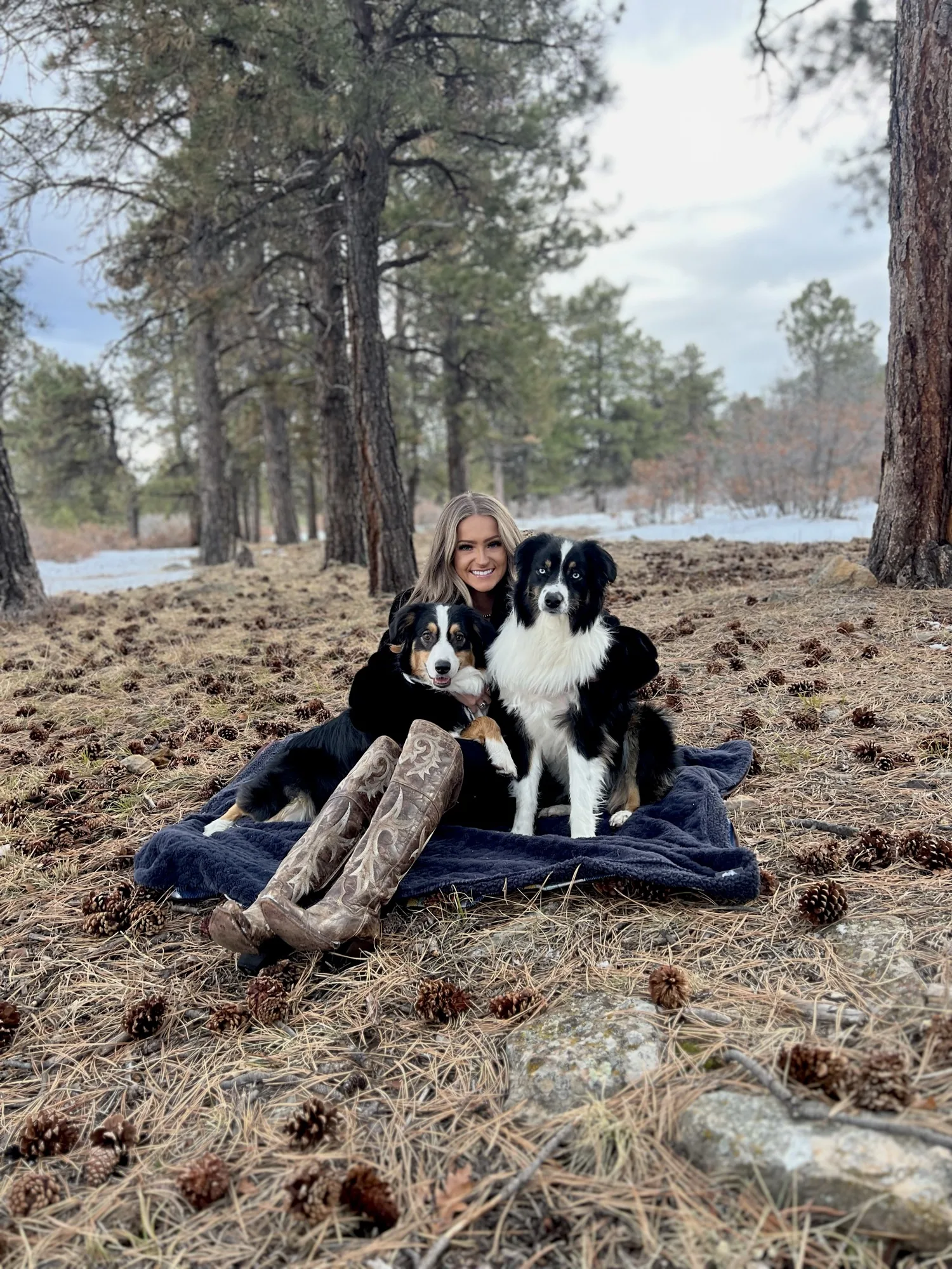 Makura with her Australian Shepherds